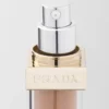 Base de maquillaje optimizadora de la piel Prada Reveal – Mw45 – Tono medio cálido Base de maquillaje optimizadora de la piel Prada Reveal – Mw45 – Tono medio cálido