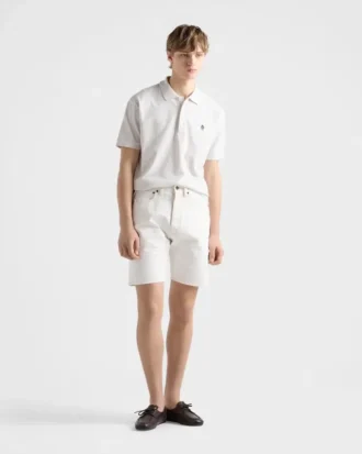 Bermudas de denim desgastado