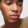Bálsamo labial Prada Optimizing Care – U011 – Noisette Bálsamo labial Prada Optimizing Care – U011 – Noisette