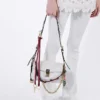 Bolso de hombro pequeño de piel Prada Soft con charms Bolso de hombro pequeño de piel Prada Soft con charms
