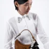 Bolso de hombro pequeño Prada Arqua de piel de oveja Bolso de hombro pequeño Prada Arqua de piel de oveja