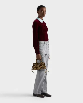Bolso de mano Prada Bonnie Mini de piel estampada