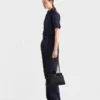 Bolso de piel mediano Prada Passage con solapa de Re-Nylon Bolso de piel mediano Prada Passage con solapa de Re-Nylon
