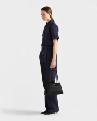 Bolso de piel mediano Prada Passage con solapa de Re-Nylon Bolso de piel mediano Prada Passage con solapa de Re-Nylon