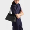 Bolso de piel mediano Prada Passage con solapa de Re-Nylon Bolso de piel mediano Prada Passage con solapa de Re-Nylon