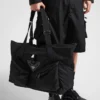 Bolso de viaje de Re-Nylon y piel Bolso de viaje de Re-Nylon y piel