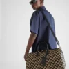Bolso de viaje grande de tela con el símbolo Symbole de Prada bordado Bolso de viaje grande de tela con el símbolo Symbole de Prada bordado