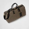 Bolso de viaje grande de tela con el símbolo Symbole de Prada bordado Bolso de viaje grande de tela con el símbolo Symbole de Prada bordado