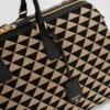 Bolso de viaje grande de tela con el símbolo Symbole de Prada bordado Bolso de viaje grande de tela con el símbolo Symbole de Prada bordado