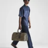 Bolso de viaje grande de tela con el símbolo Symbole de Prada bordado Bolso de viaje grande de tela con el símbolo Symbole de Prada bordado