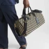 Bolso de viaje grande de tela con el símbolo Symbole de Prada bordado Bolso de viaje grande de tela con el símbolo Symbole de Prada bordado