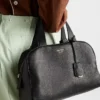 Bolso grande de cuero con asa superior