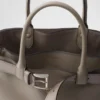 Bolso grande de piel con hebilla Prada y cinturón