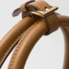 Bolso grande de piel con hebilla Prada y cinturón