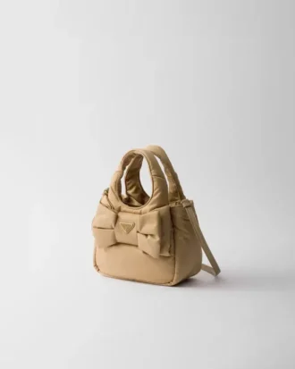 Bolso mini acolchado de Re-Nylon con lazo