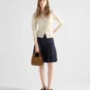 Bolso mini acolchado de Re-Nylon con lazo