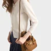Bolso mini acolchado de Re-Nylon con lazo