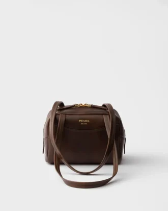 Bolso mini con asa superior de piel envejecida de Prada