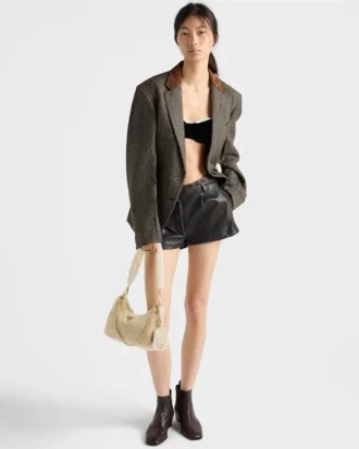 Bolso mini de piel de oveja Prada Re-Edition