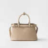 Bolso pequeño de piel con hebilla y doble correa de Prada Bolso pequeño de piel con hebilla y doble correa de Prada