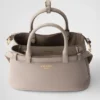 Bolso pequeño de piel con hebilla y doble correa de Prada Bolso pequeño de piel con hebilla y doble correa de Prada