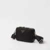 Bolso Prada Brique Re-Nylon y piel Saffiano Bolso Prada Brique Re-Nylon y piel Saffiano