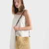 Bolso tipo cubo pequeño de ganchillo y cuero Bolso tipo cubo pequeño de ganchillo y cuero