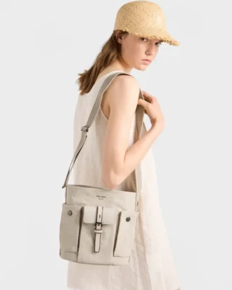 Bolso tipo cubo Prada Route Mini de lona y piel