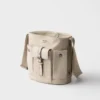 Bolso tipo cubo Prada Route Mini de lona y piel