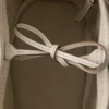 Bolso tipo cubo Prada Route Mini de lona y piel