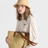 Bolso tote mediano de ganchillo y cuero Bolso tote mediano de ganchillo y cuero