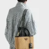 Bolso tote mediano de mimbre y lona Bolso tote mediano de mimbre y lona