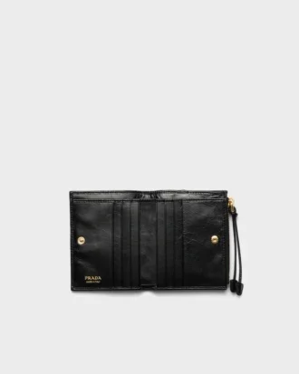 Cartera pequeña de piel