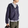 Chaqueta blusón con capucha de tejido técnico