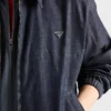 Chaqueta blusón de denim de cambray con cremallera
