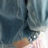 Chaqueta blusón de denim y cuero Chaqueta blusón de denim y cuero