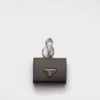 Estuche para auriculares de piel Saffiano con llavero