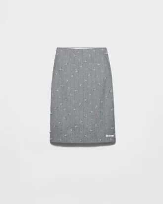 Falda midi de lana con rayas finas y adornos