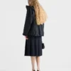 Falda midi de tejido técnico y de tipo «hopsack» Falda midi de tejido técnico y de tipo «hopsack»