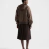 Falda midi plisada con costura rush Falda midi plisada con costura rush