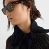 Gafas de sol con el logotipo de Prada Gafas de sol con el logotipo de Prada