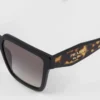 Gafas de sol con el logotipo de Prada Gafas de sol con el logotipo de Prada
