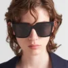Gafas de sol con el logotipo de Prada Gafas de sol con el logotipo de Prada