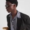 Gafas de sol con placa metálica icónica Gafas de sol con placa metálica icónica
