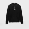 Jersey de cuello redondo de lana con colgante Jersey de cuello redondo de lana con colgante