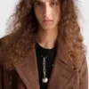 Jersey de cuello redondo de lana con colgante Jersey de cuello redondo de lana con colgante