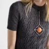 Jersey de lana de manga corta con colgante