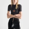 Jersey de lana de manga corta con colgante