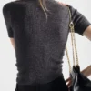 Jersey de lana de manga corta con colgante