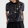 Jersey de lana de manga corta con colgantes